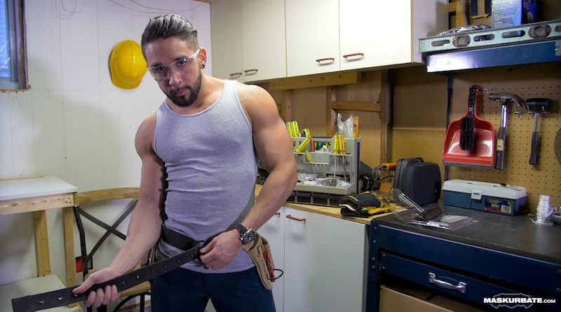 Muscle man getting naked in the garage