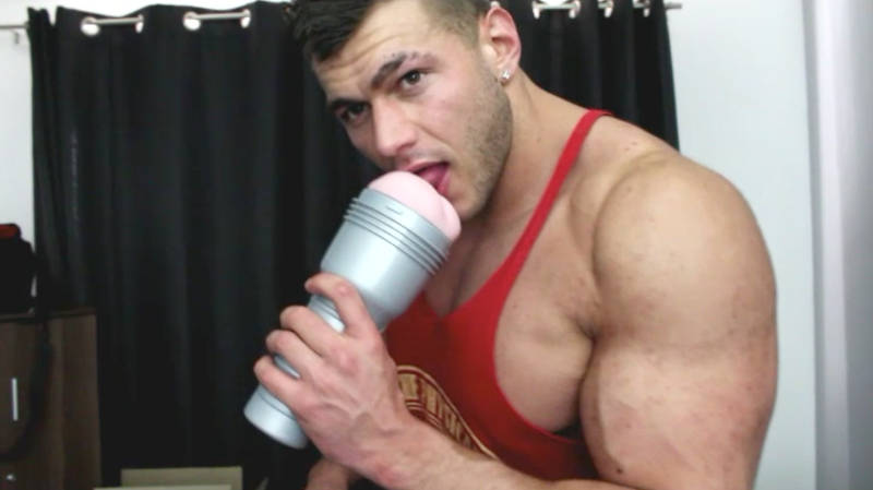 muscle man licking a fleshlight