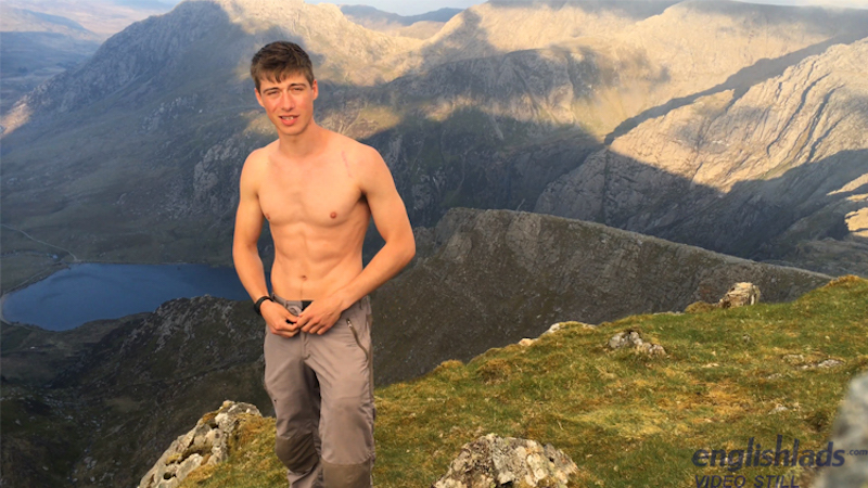 shirtless straight guy mountain climbing